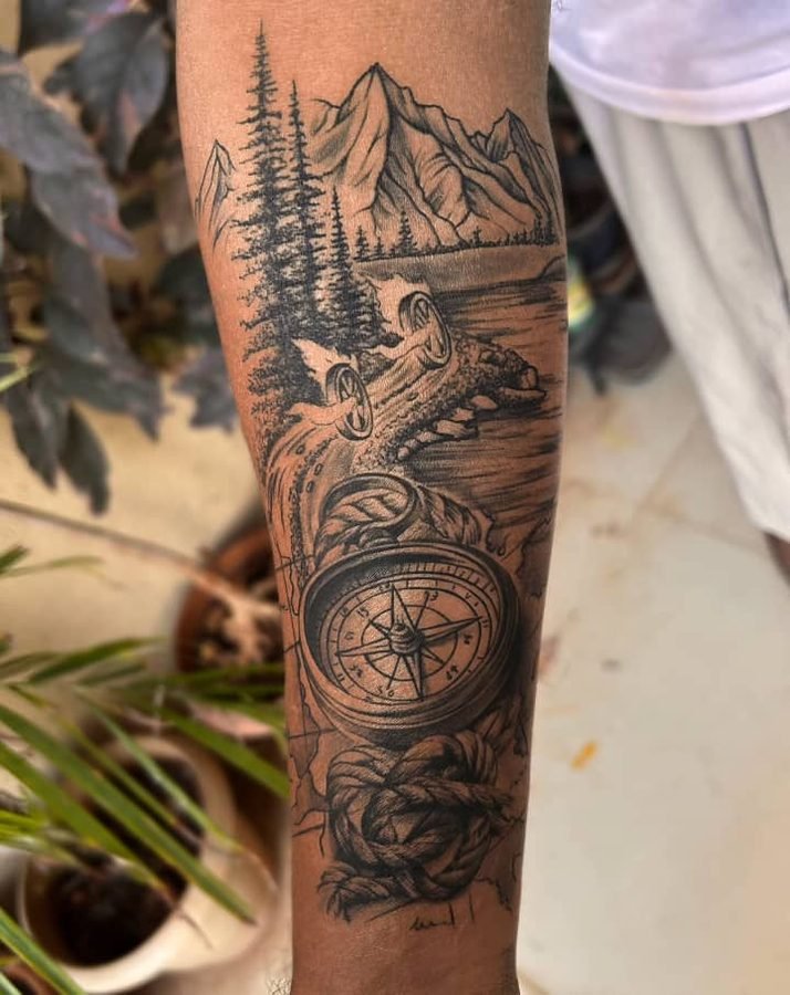 Mountain and river compass tattoo with rope detail