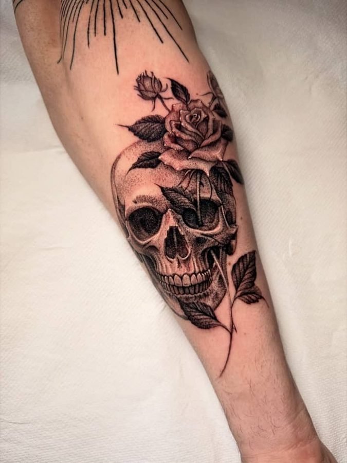 Skull with rose growing through, forearm piece