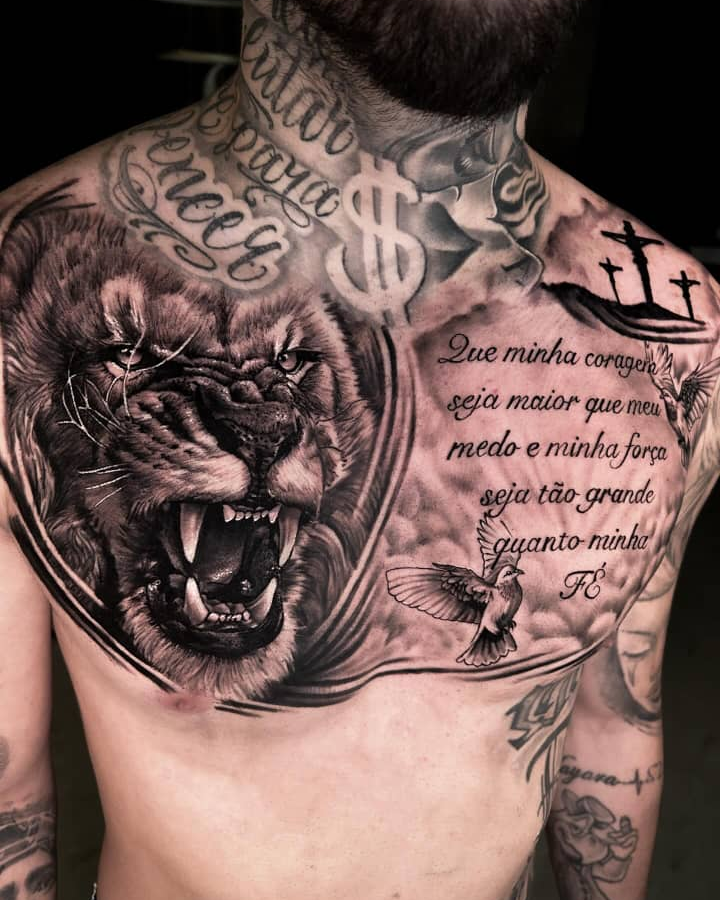 Full chest tattoo of a realistic lion with script lettering and doves